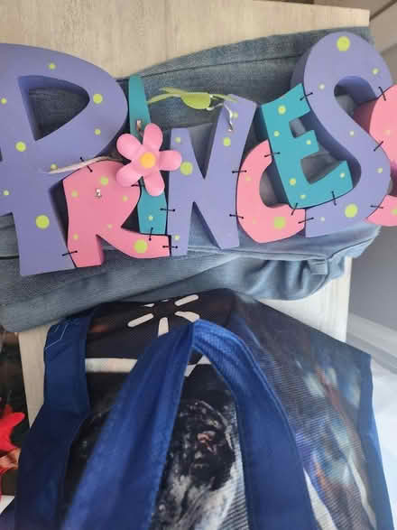 Photo of free Little girl jeans & sign (Bloomfield) #1