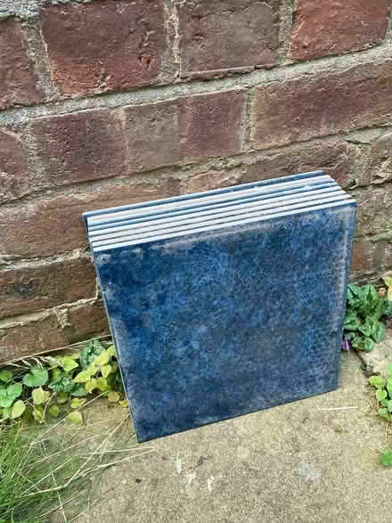 Photo of free 8 dark blue floor tiles (Malvern Link WR14) #1
