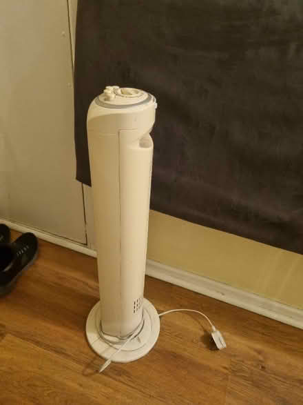 Photo of free Grey king size head board and fan (wigan) #3