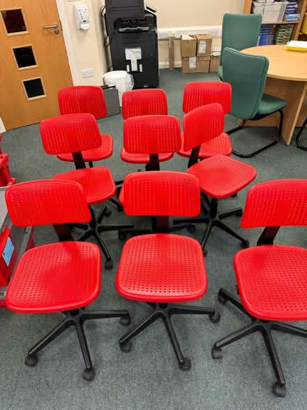 Photo of free 9 red swivel chairs (W8) #1
