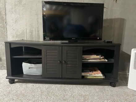 Photo of free Brown wood bookshelf (Reserve at Medina, Medina) #3