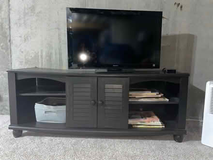 Photo of free Brown wood bookshelf (Reserve at Medina, Medina) #2