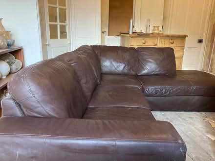 Photo of free Brown faux-leather L-shaped couch (New Brighton) #1