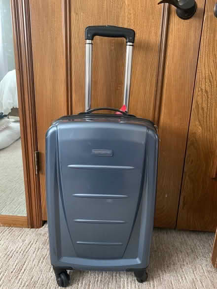 Photo of free Carry on sized suitcase (East side of wichita) #1