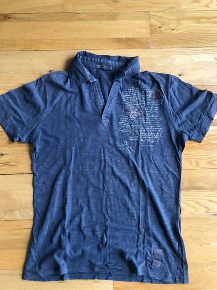 Photo of free Assortment of men’s t-shirts (OX26) #1