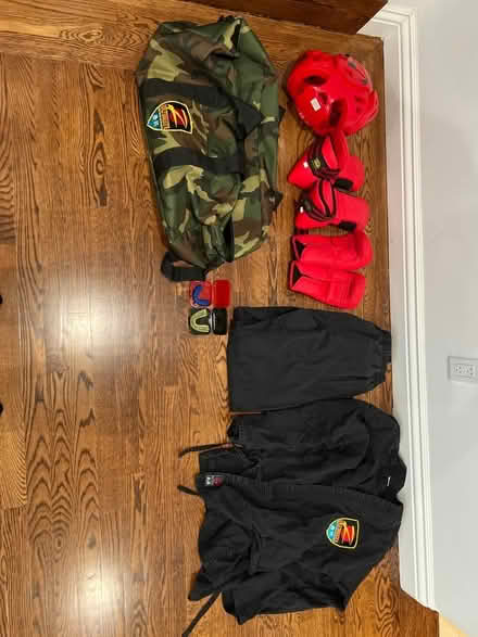 Photo of free lrg child karate uniform, spar equp (San Mateo Baywood) #1