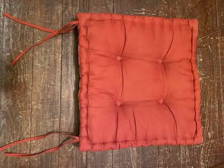 Photo of free Red Fabric Chair Cushion (Cleveland Park) #1