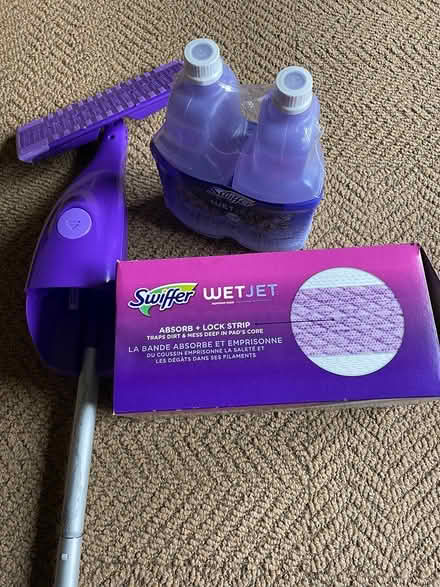 Photo of free Swiffer wet mop, cleaners & pads (94579 (San Leandro)) #1
