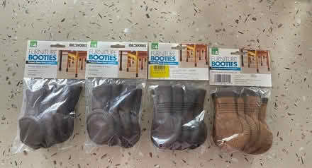 Photo of free Chair socks (Amityville) #1