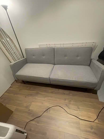Photo of free Grey Futon/Couch/Sofa (Union Market) #2