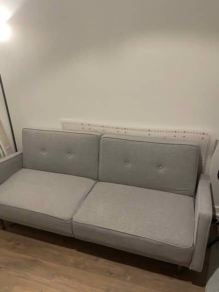 Photo of free Grey Futon/Couch/Sofa (Union Market) #1