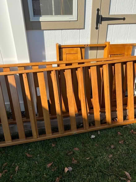 Photo of free Wood futon with a thick mattress (Elkridge) #1