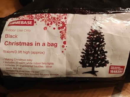 Photo of free Small black Christmas tree with baubles and star (Upper Walthamstow E17) #1