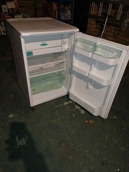 Photo of free Hotpoint fridge freezer 55 cm wide (Royston SG8) #1