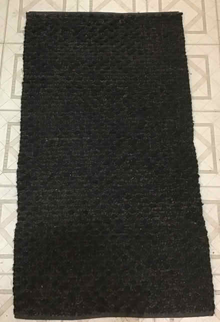 Photo of free Black rug (Inman Square) #1
