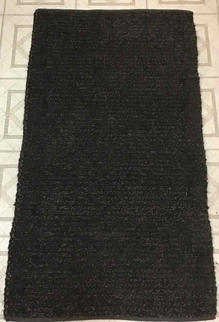 Photo of free Black rug (Inman Square) #2
