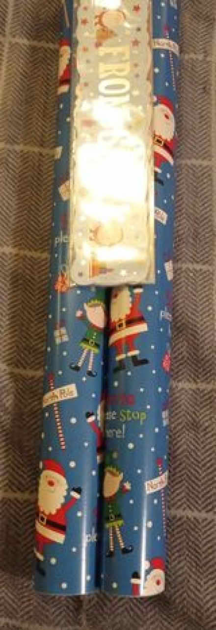 Photo of free 2 x three quarter rolls of Christmas wrapping paper (Cleveleys FY5) #1