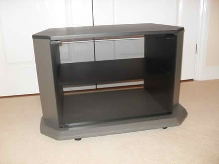 Photo of free TV cabinet on wheels, glass door (BA15 Centre Bradford on Avon) #1