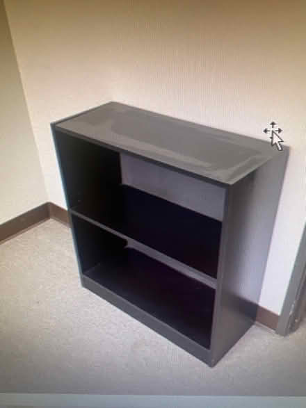 Photo of free Black book shelve (W Wilson St/Newport Blvd) #1