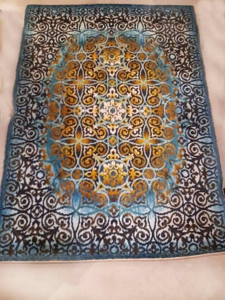 Photo of free Large vintage rug turquoise/blue/black/brown colours, fair (Sprowston NR3) #1