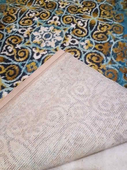 Photo of free Large vintage rug turquoise/blue/black/brown colours, fair (Sprowston NR3) #3