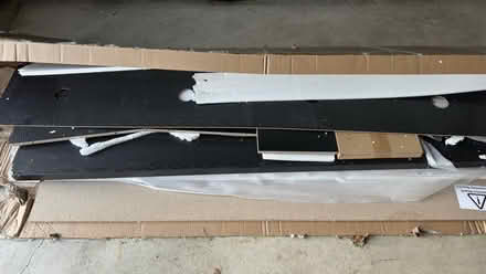 Photo of free TV stand (unassembled) (Ashburn) #4