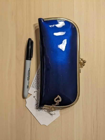 Photo of free Blue clutch purse (Bowling Brook Farms) #1
