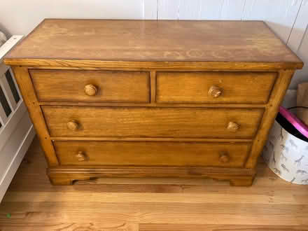 Photo of free Four drawer wood dresser (South Arlington (Claremont)) #1