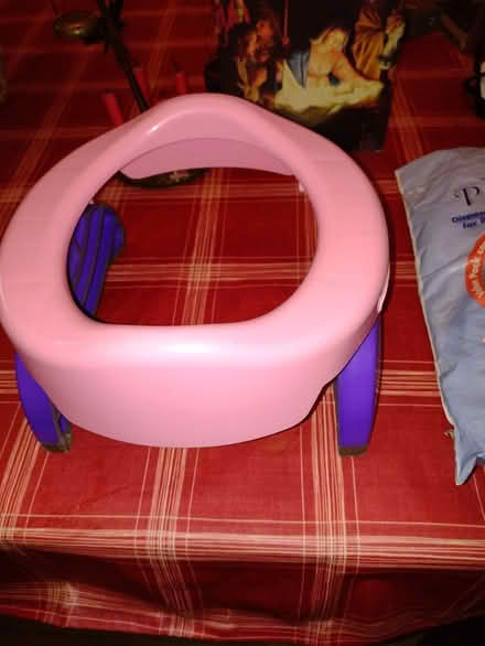 Photo of free Portable potty and liners (Crewe CW1) #1