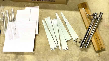 Photo of free New Everbilt closet system pieces (Cabin John near Bethesda) #1