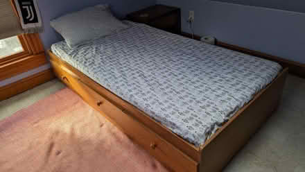 Photo of free Wood twin bed frame w/3 drawers (Roslindale) #1