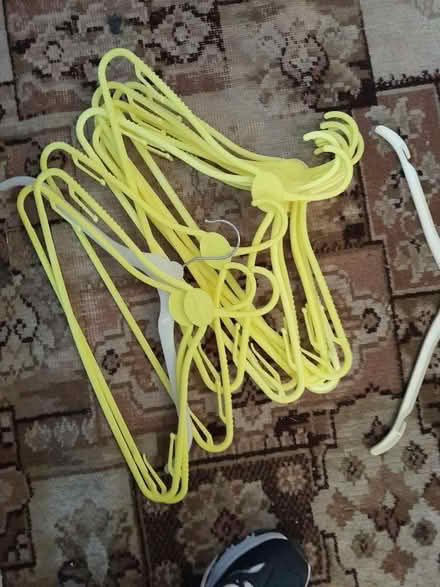 Photo of free yellow plastic hangers (Lewisham SE13) #1