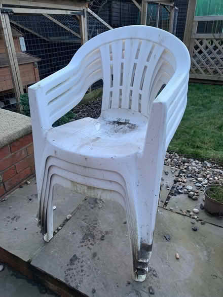 Photo of free 4 plastic garden chairs (NE24 South Beach, Blyth) #1