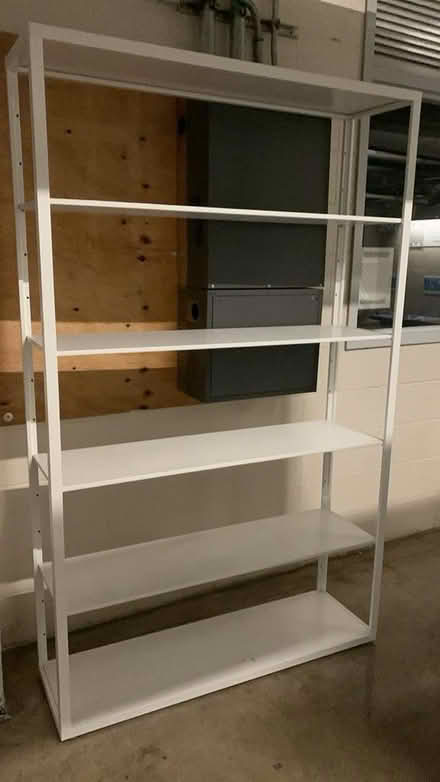 Photo of free Tall white metal shelf (16 Street & First Ave Manhatta) #1