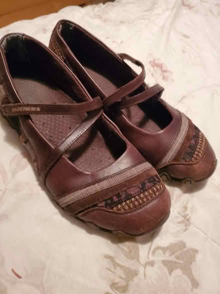 Photo of free Skechers brown flats shoes? (East, close to NE) #1