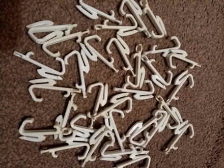 Photo of free 31 curtain hooks (Littleover DE23) #1