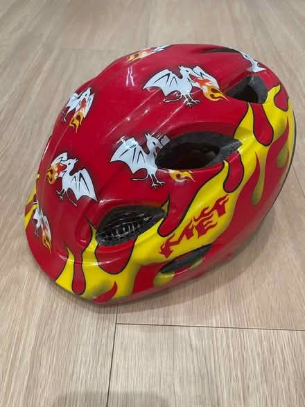 Photo of free Red Kids bicycle helmet (Guildford GU2) #1
