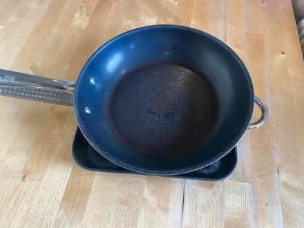 Photo of free Cast iron grill and a frying pan (NE40) #1