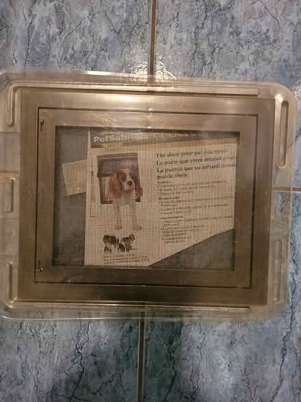 Photo of free Dog door(screen flap) (Streetsville area) #1