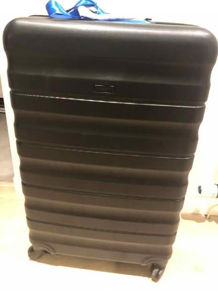 Photo of free Black John Lewis suitcase (good condition) (Morningside EH10) #1