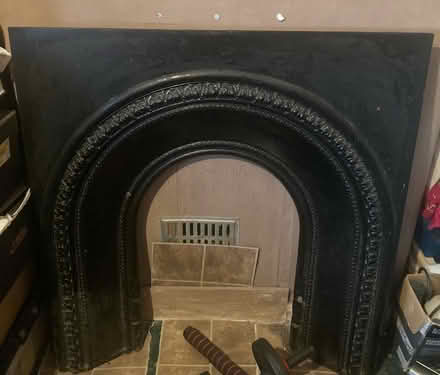 Photo of free Cast iron (?) heavy fire surround (Holme Village) #1