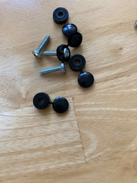 Photo of free Screws and caps for car registration plate (Knotty Ash L14) #1
