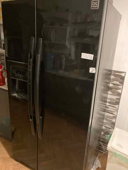 Photo of free American style fridge freezer (Victoria park CF5) #1