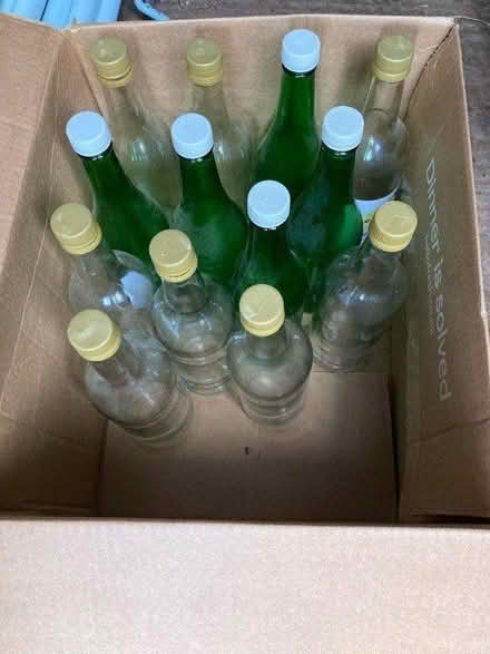 Photo of free 13 x glass screwtop bottles (Northmoor OX29) #1
