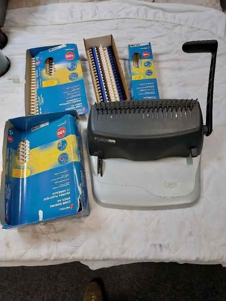 Photo of free Document binding machine with binders (Sagar Holme) #1