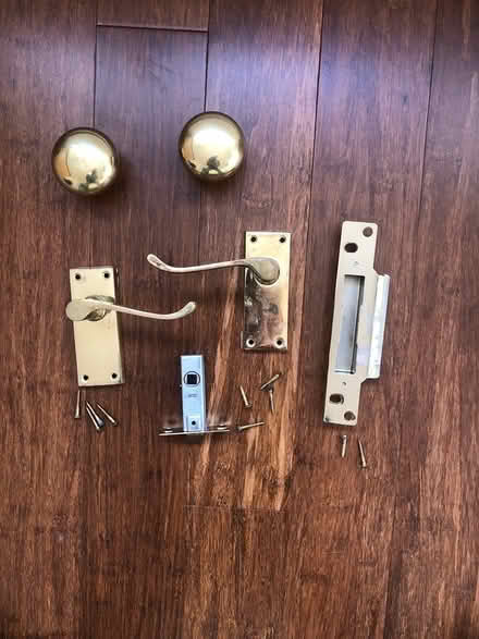 Photo of free Used gold door handle set (KT15. Woodham.) #1