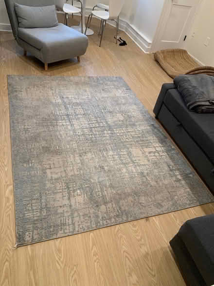 Photo of free 5 x 7 blue/grey Calvin Klein rug (Dupont Circle) #1