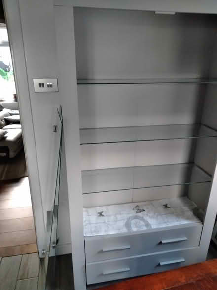 Photo of free Free standing unit with glass shelves and glass doors. (Overton LA3) #2