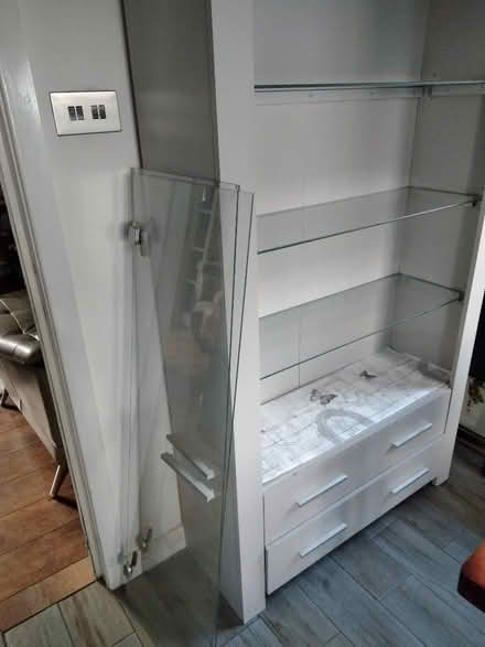 Photo of free Free standing unit with glass shelves and glass doors. (Overton LA3) #1
