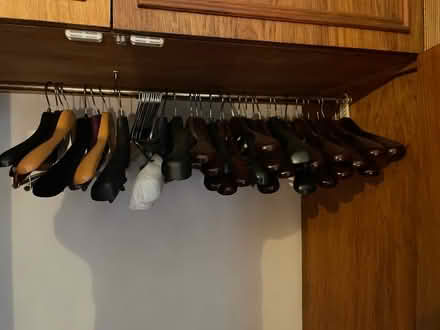 Photo of free Wooden and plastic hangers (Stoke Newington N16) #1